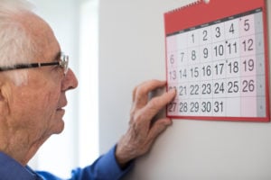 man checking calendar