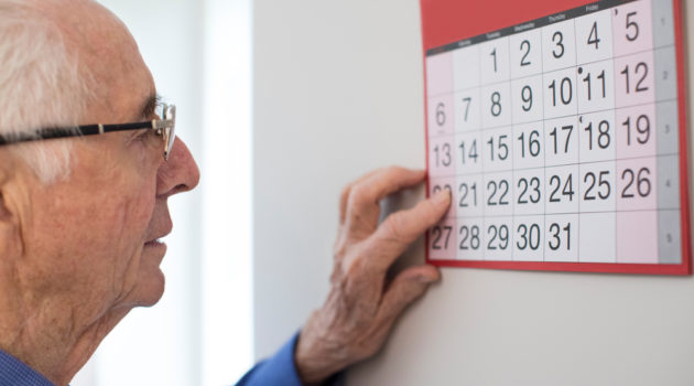 man checking calendar