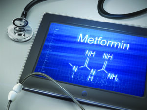 metformin word displayed on tablet