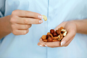 Close up of a handful of heart healthy nuts