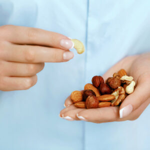 Close up of a handful of heart healthy nuts