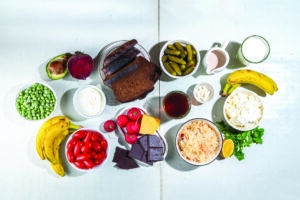 An array of foods that are high in prebiotics on top of a table.