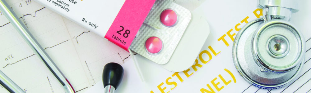 Effects and treatment of statins concept photo. Open packaging with drugs tablets, on which is written "Statin Medication", lies near stethoscope, result analysis on cholesterol (lipid panel) and ECG