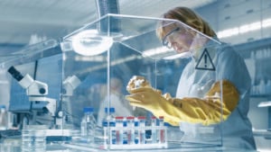 Senior Female Epidemiologist Works with Samples.