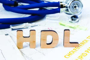 The letters "HDL" on top of a medical chart